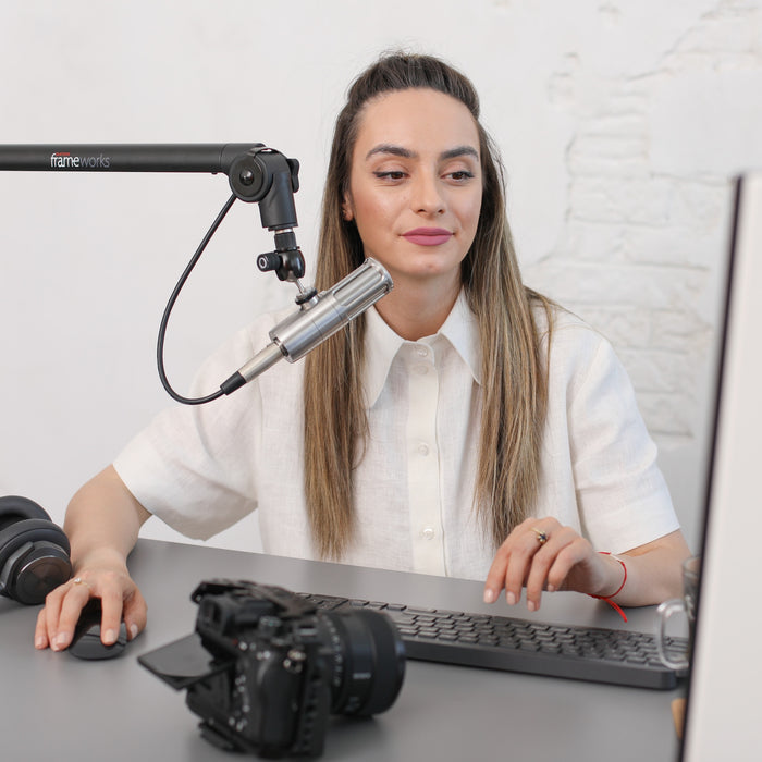 Female Content Creator Preparing To Caption YouTube Video In YouTube Studio